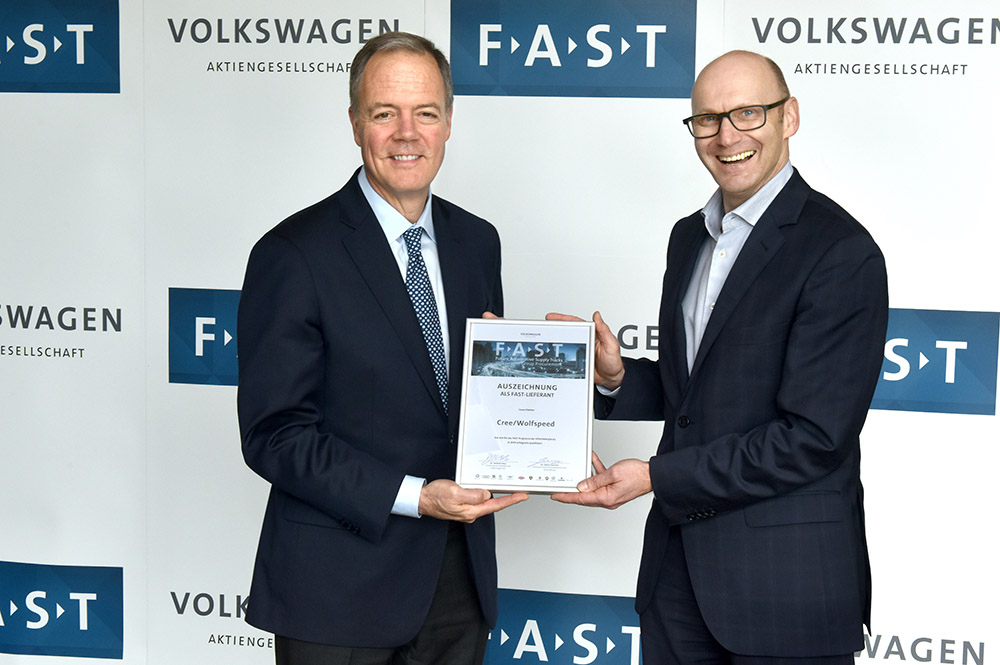 Cree CEO, Gregg Lowe stands with Mr. Michael Baecker, Head of Volkswagen Purchasing Connectivity during Volkswagen Group’s FAST partner selection ceremony held internally at their Wolfsburg, Germany headquarters today.